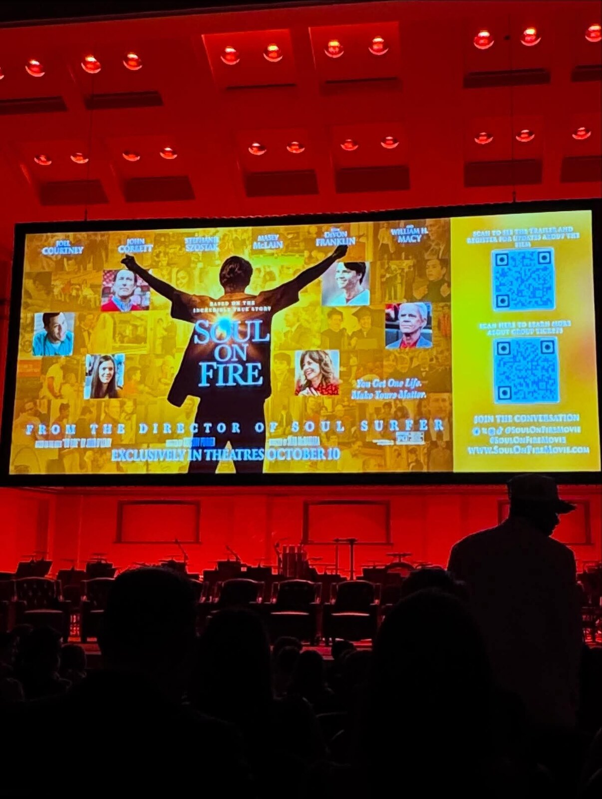 Soul on Fire premiere presentation displayed above an orchestra performance environment